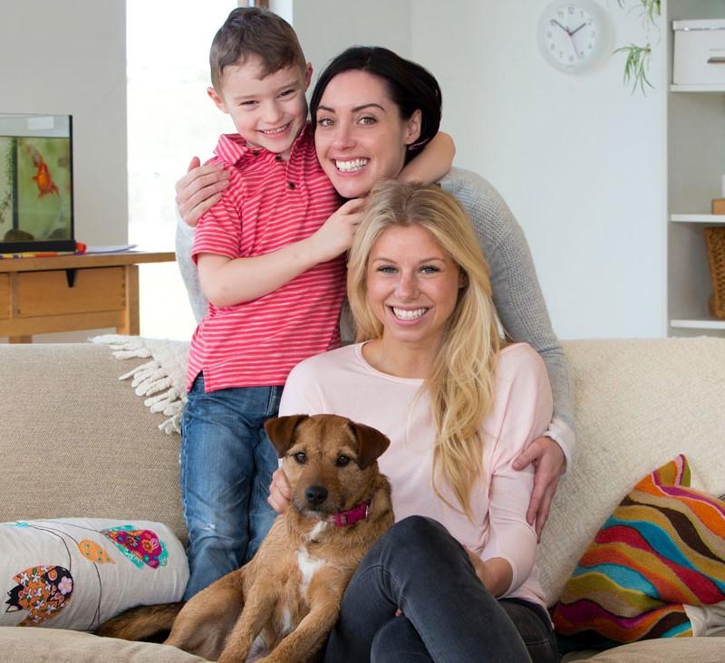 Couple with child and dog