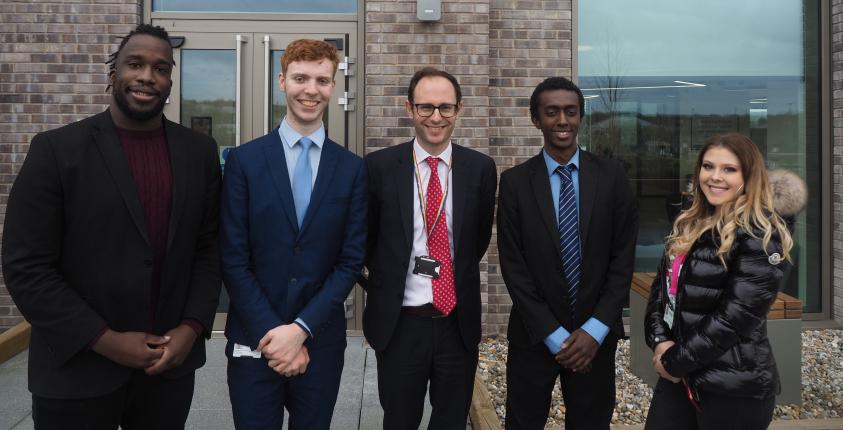 From L-R: Christopher Lewinson, Environmental Enforcement Business Support Apprentice; Derek Gibson, Business Support Admin Apprentice; John Hooton, CEO; Nathan Tadesse, Data and Systems Apprentice; and Renata Lupica, Workforce Development Support Officer